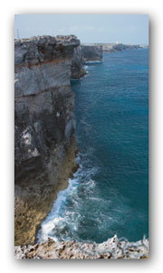 Slate gray cliffs of Eleuthera near Glass Window Bridge